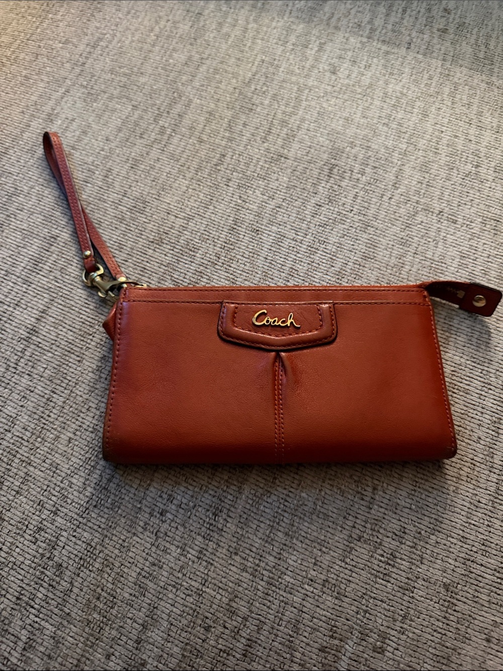 Coach Leather Wristlet in Chestnut Brown/Orange with Gold Logo